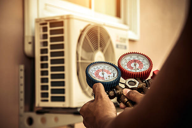Professional Heat Pump Repair technician working in Mansfield, OH